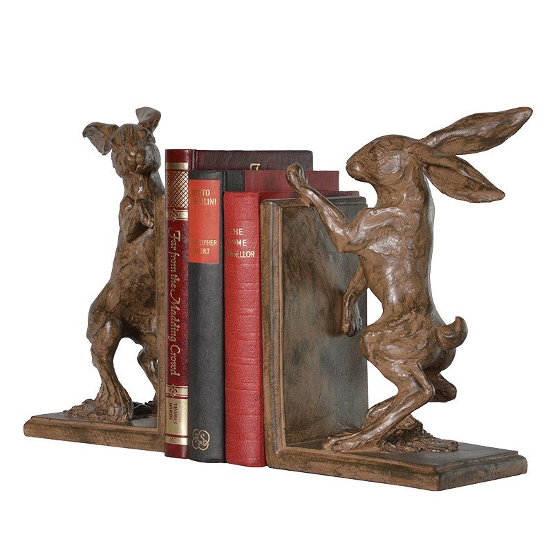 A pair of hare bookends, both captured on hind legs. Made of resin and finished with a distressed look so the overall appearance is antique. 